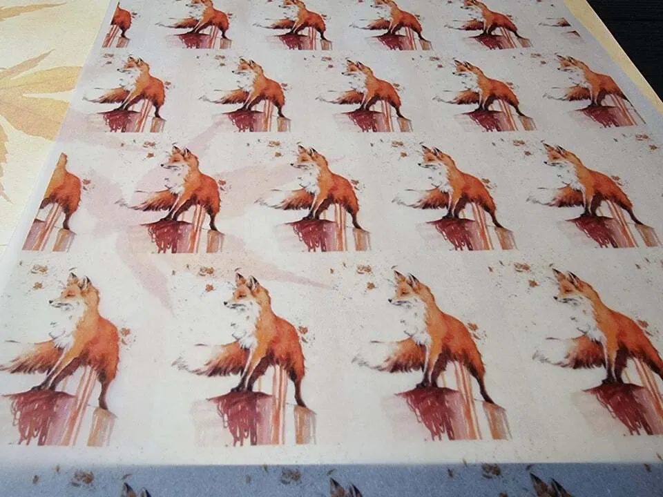 Printed vellum paper with a repeating red fox pattern